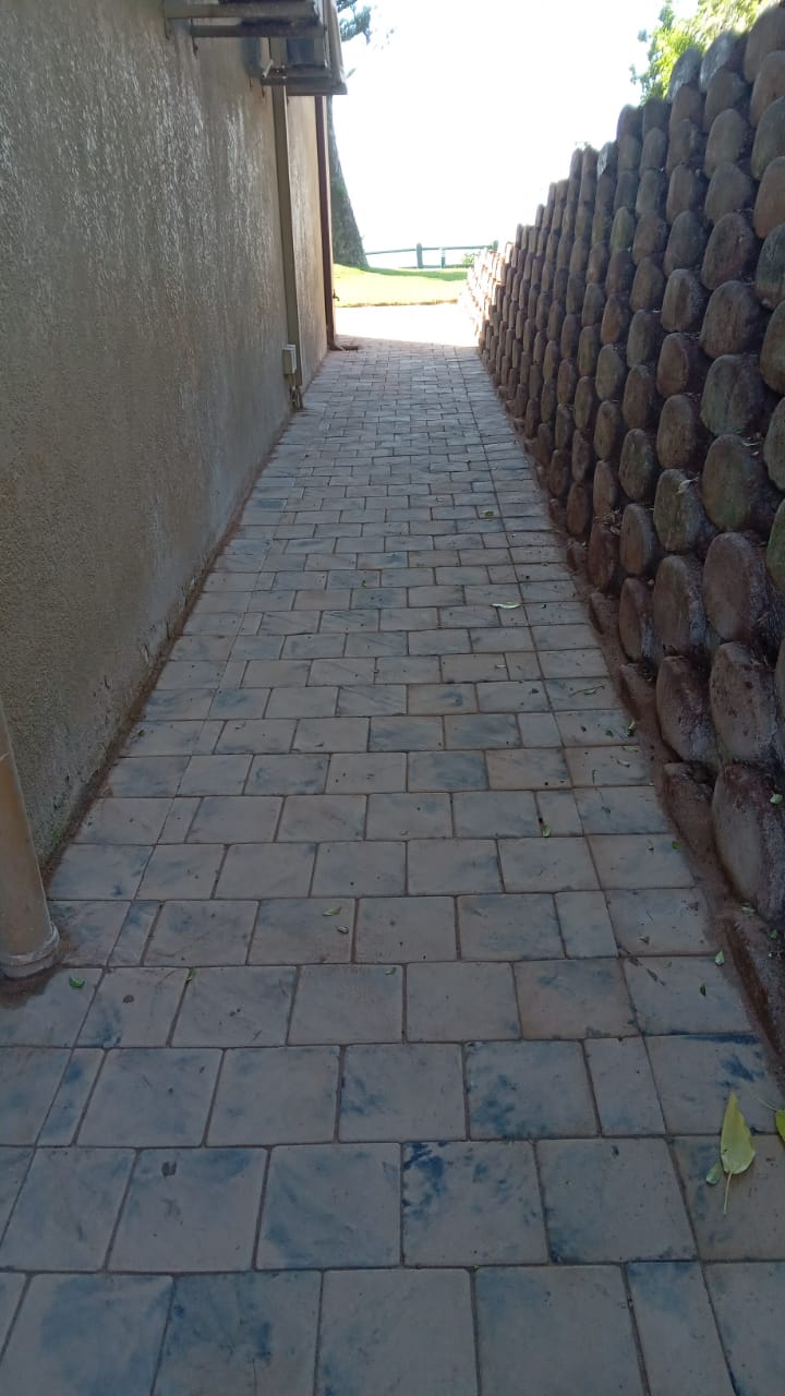 Replacing pavers and retaining wall